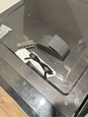 Prada Black Sunglasses with Textured Gray Case